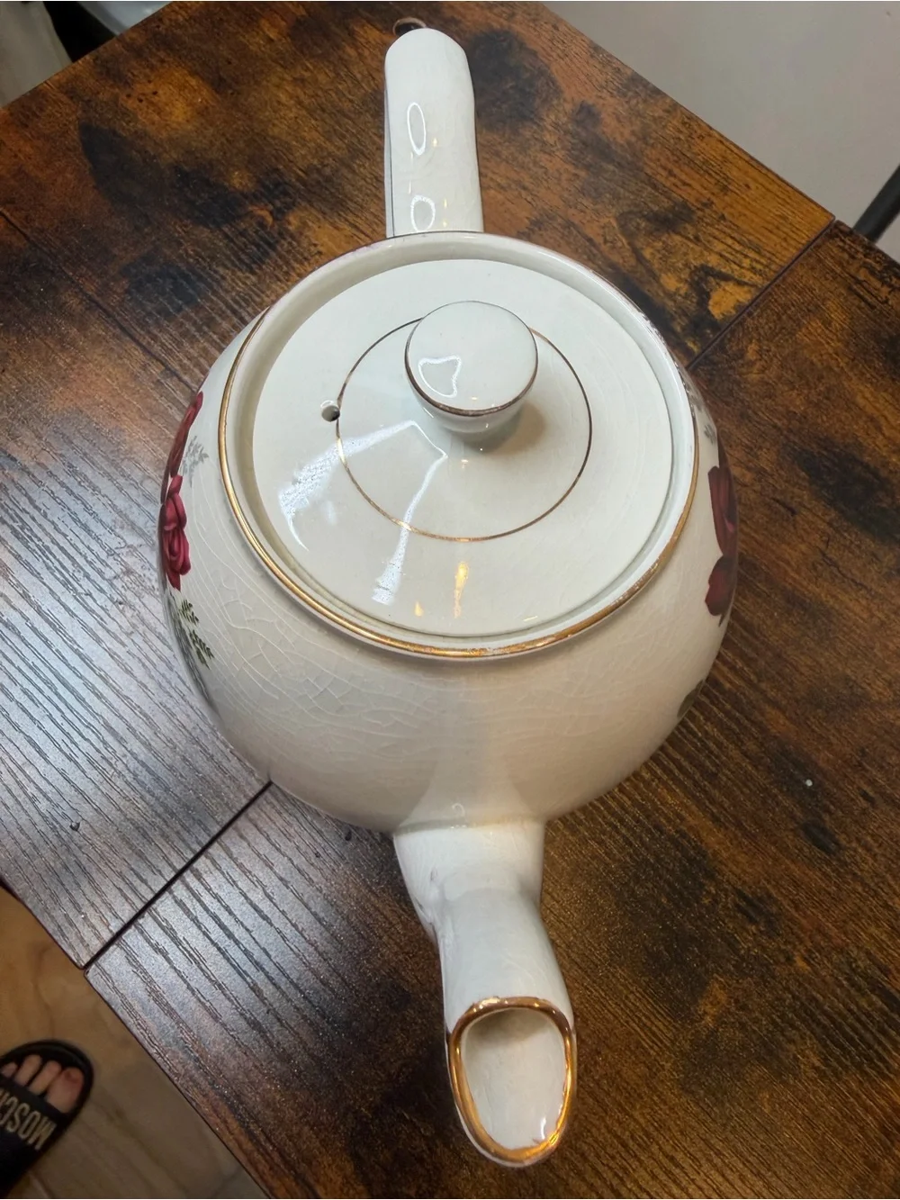 Vintage Ellgreave England red rose teapot featuring delicate gold trim.